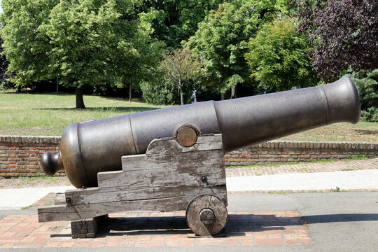 Old historical iron cannon on wooden carriage displayed in a park at Kalemegdan Fortress