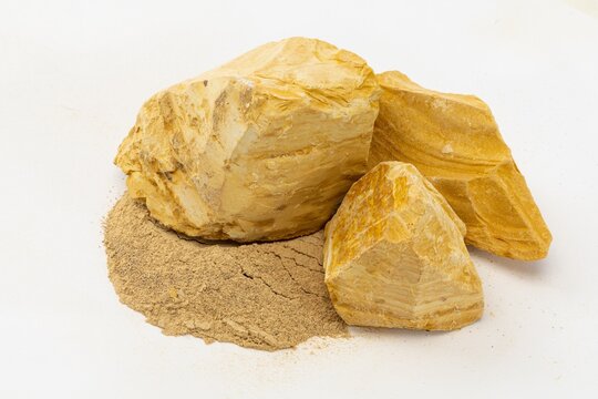 Still Life of Banded Yellow Layered Soil and Fine Soil Powder