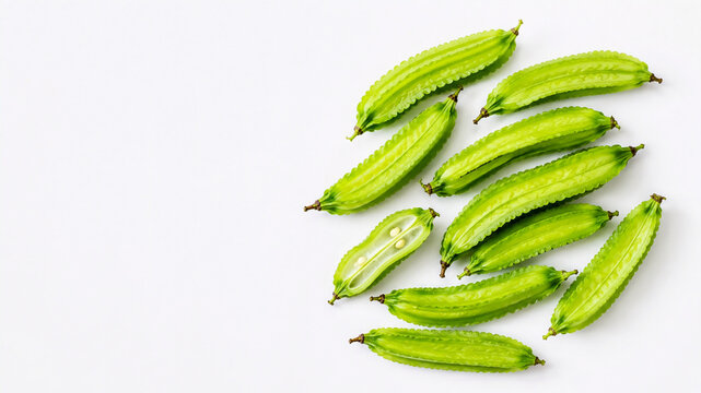 Young winged beans viewed from above in a minimalist composition.