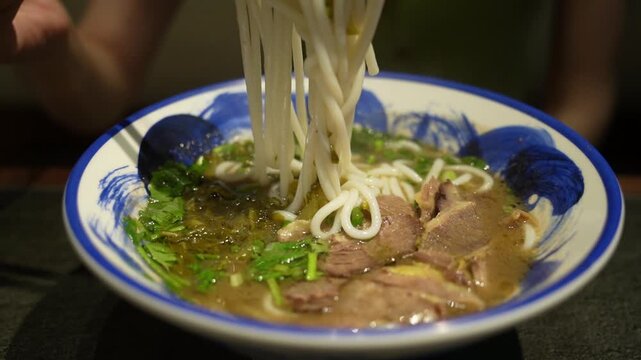 Close up shot of the delicious Guizhou beef rice noodles in restaurant