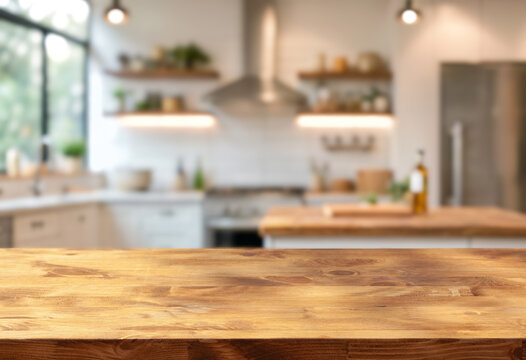 natural wooden table top on foreground and blurred kitchen interior