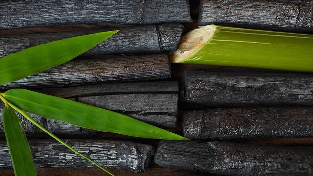 Bamboo charcoal stick on wooden board.