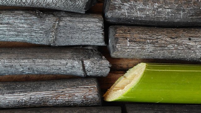 Bamboo charcoal stick on wooden board.