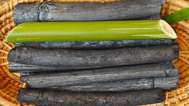 Bamboo charcoal stick on wooden board.