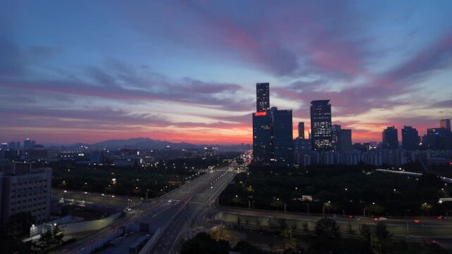 Seoul City Sunrise Skyline Background with Defocused Bokeh Lights over Yeouido Highway Traffic
