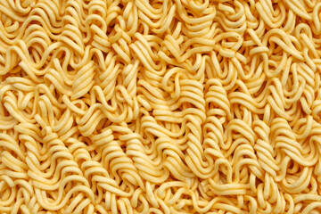Obraz premium dry instant noodles texture background close up