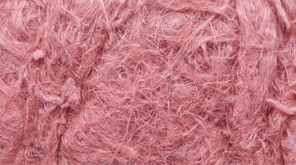 Fototapeta premium Pink fiberglass insulation batt fibres seen up close in fine detail