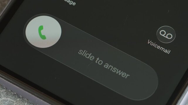 Incoming call on mobile phone close up macro video. Take or decline the phone call