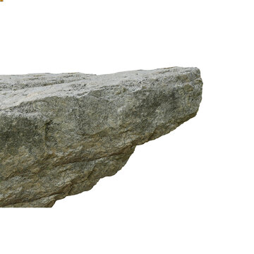 Rough hewn rock formation against a black background detailed texture stone cliff ledge outcrop geology geological mineral granite sedimentary uneven fragment fragmented natural