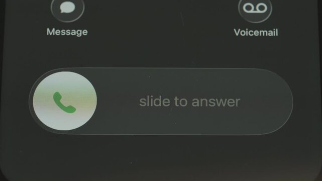 Incoming call on mobile phone close up macro video. Take or decline the phone call