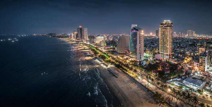 Aerial view of the skyline and nightscape of Da Nang, a coastal city in Vietnam.