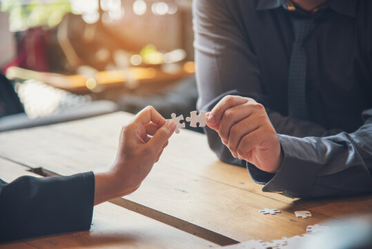Unified synergy assembly business game implementation multiple puzzle meeting. Business connections strategy synergy team solution. Implement puzzle improve communication solve synergy organize team