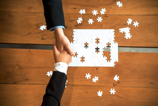Unified synergy assembly business game implementation multiple puzzle meeting. Business connections strategy synergy team solution. Implement puzzle improve communication solve synergy organize team