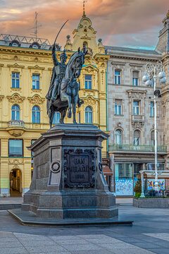 ZAGREB, CROATIA - JUNE 4, 2022: Statue of Ban Jelacic, the monument of the famous croatian general, on central city square (Trg Bana Jelacica). The oldest standing building here was built in 1827.
