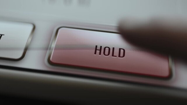 Red Hold Button on a Fusion Reactor Control Interface