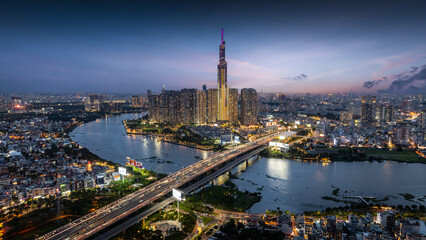 Naklejka premium Aerial view of the skyline and nightscape of Ho Chi Minh City, Vietnam