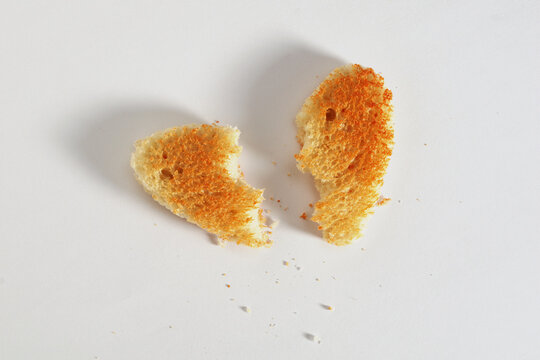 Broken heart shaped toasted bread