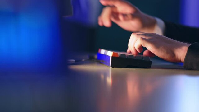 Hand Pressing Keyboard Key On Computer Desk Typing Technology Blue Light Office Work Close Up Modern Workspace Keypad Control Equipment Soft Background