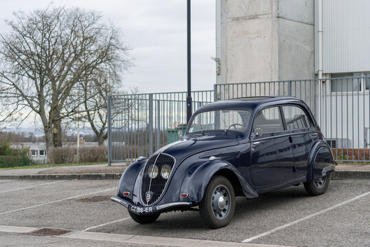 Nancy, France - March 3rd 2019 : View on a blue Peugeot 202 parked in a street. The Peugeot 202 is a supermini produced by the French car manufacturer Peugeot between 1938 and 1949.