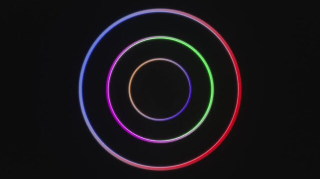 Three Concentric Glowing Neon Rings Rotating Seamless Loop