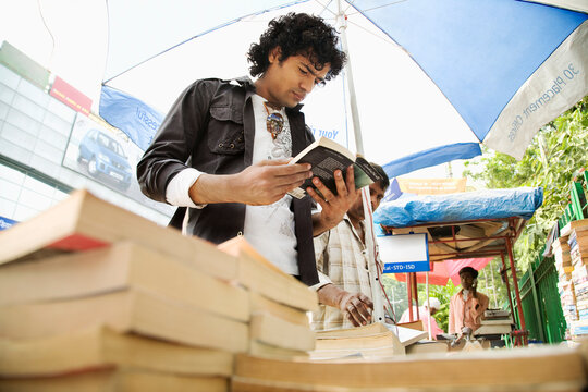 Man at a book stall 
