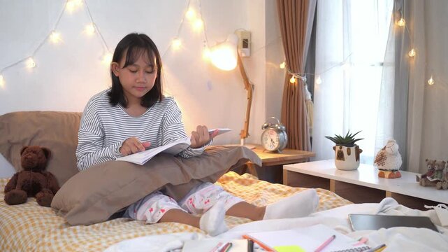 	
Young woman sitting comfortably on bed, Peaceful Evening Reading in a Cozy Bedroom with soft fairy lights	
