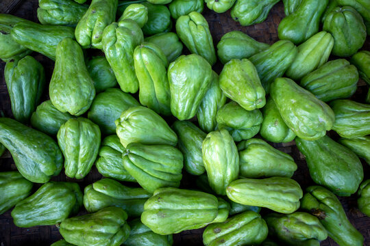 Pile of chayote (Sechium edule) on the vegetable market.
