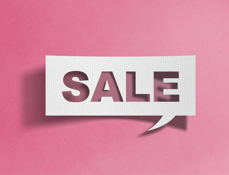 Paper speech bubble with sale text cutout on pink background, shopping and discount promotion concept
