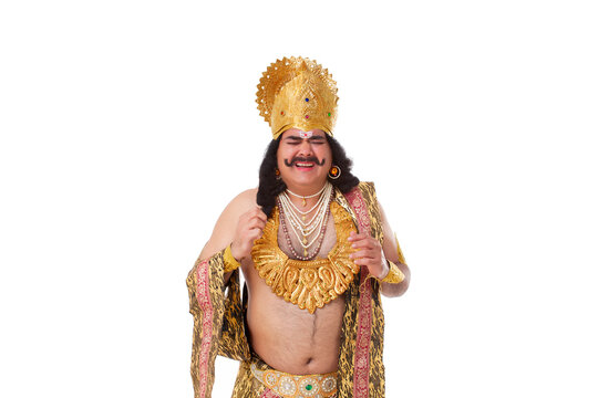 Man dressed as Raavan getting a headache 