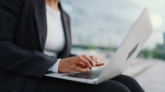 Female user with laptop, closeup of hands typing message on keyboard, freelance. It professional or businesswoman sending emails by computer, work online and e-learning worldwide, internet fraud