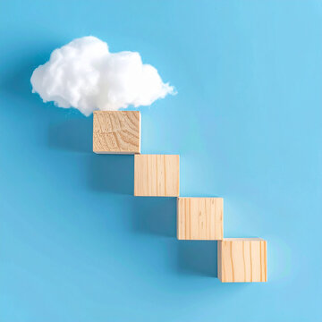 Piezas de madera formando una escalera ascendente hacia una nube sobre fondo azul. Concepto de progreso, crecimiento personal, superaci&oacute;n, &eacute;xito, objetivos y desarrollo profesional.