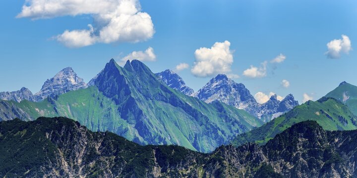 Summer in the Alps, mountain panorama from Fellhorn 2037 m, of the green grassy H&ouml;fats, 2259 m, Hochvogel in the back left, 2592 m, and on the right Kleiner Wilder, 2306 m, Allg&auml;u Alps, Bavaria, Germany