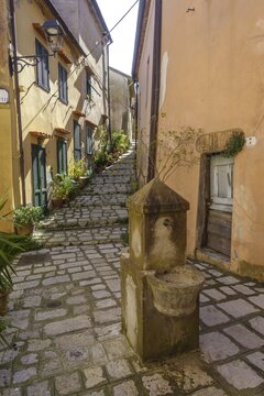 Old town alley with fountain, Rio nell'Elba, Livorno Province, Italy