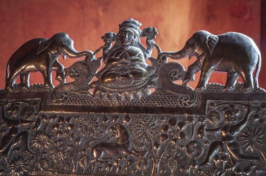 Goddess of prosperity and wealth, Lakshmi flanked by elephants, detail of a silver-plated, richly decorated chair, Chapslee Hotel, former summer residence of Raja of Kapurthal, Elysium Hill, Lakkar Bazar, Shimla, Himachal Pradesh, North India, India