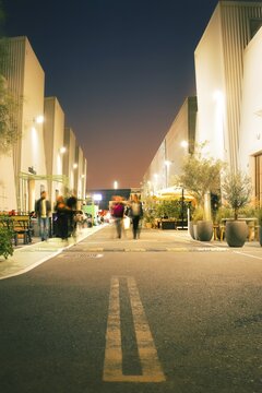 Dubai, UAE - 16th january, 2026: Alserkal Avenue at night in Al Quoz. Visitors visit Industrial galleries, shops, cafes and creative hubs illuminated under festive string lights