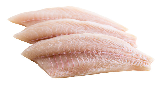 Raw white fish fillets three portions, close-up
