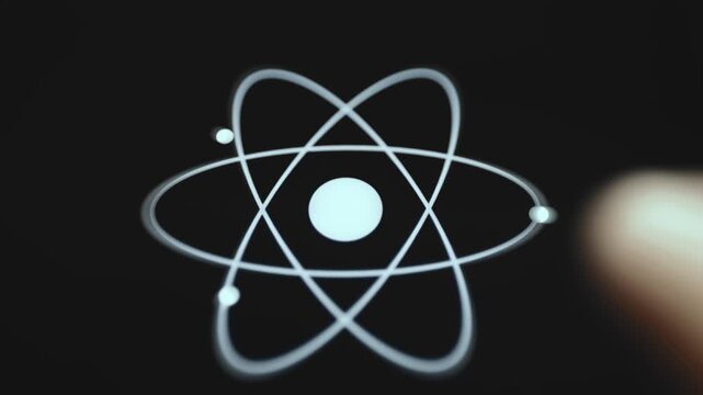 Glowing Atom Symbol With Orbiting Electrons On Dark Background