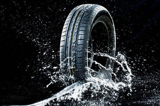 Car tyre in wetness