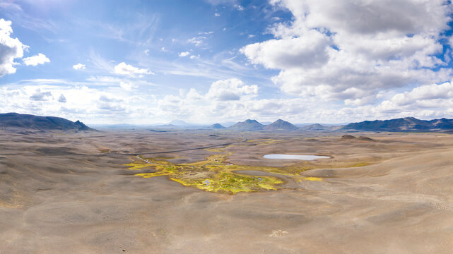 Drone captures a green oasis in the barren volcanic desert of Iceland