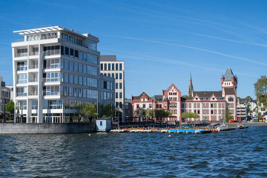 Modern building and historic castle at Phoenix-See in Dortmund