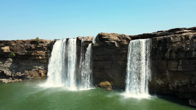 This waterfall spreads across a wide horseshoe shaped cliff, where the Indravati River creates India's widest waterfall. Chitrakote Falls, Bastar, Chhattisgarh, India.