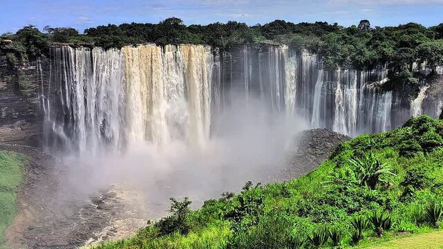 This waterfalls spread across broad cliffs, where the Lucala River forms one of Africa's largest waterfall systems. Kalandula Falls, Malanje Province, Angola.