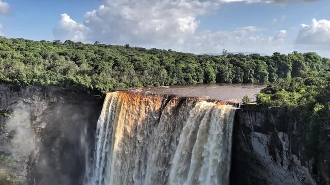 This waterfall crashes into a remote rainforest gorge, where immense water volume and towering cliffs create breathtaking scenery. Kaieteur Falls, Potaro-Siparuni, Guyana.