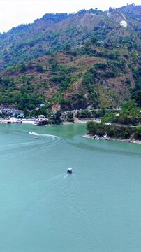 Vertical Aerial View of Chamera Lake with Speedboat, Himachal Pradesh, India