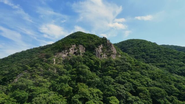 4K aerial footage of peaceful Jangansa Buddhist temple in Gijang, Busan