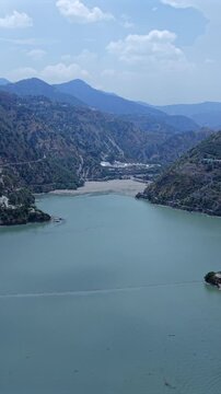 Vertical Aerial View of Chamera Lake with Speedboat, Himachal Pradesh, India