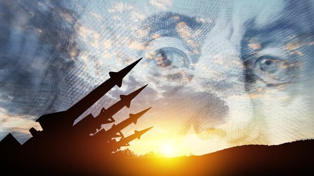 The missiles are aimed to the sky at sunset. The missiles on background of US dollar. Nuclear bomb, chemical weapons, missile defense, a system of salvo fire.