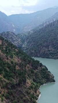 Vertical Aerial View of Chamera Lake with Speedboat, Himachal Pradesh, India