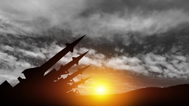 The missiles are aimed to the sky at sunset. Nuclear bomb, chemical weapons, missile defense, a system of salvo fire.