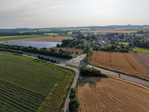 Aerial View of Agricultural Fields and Rural Road Junction in a Scenic Countryside Landscape